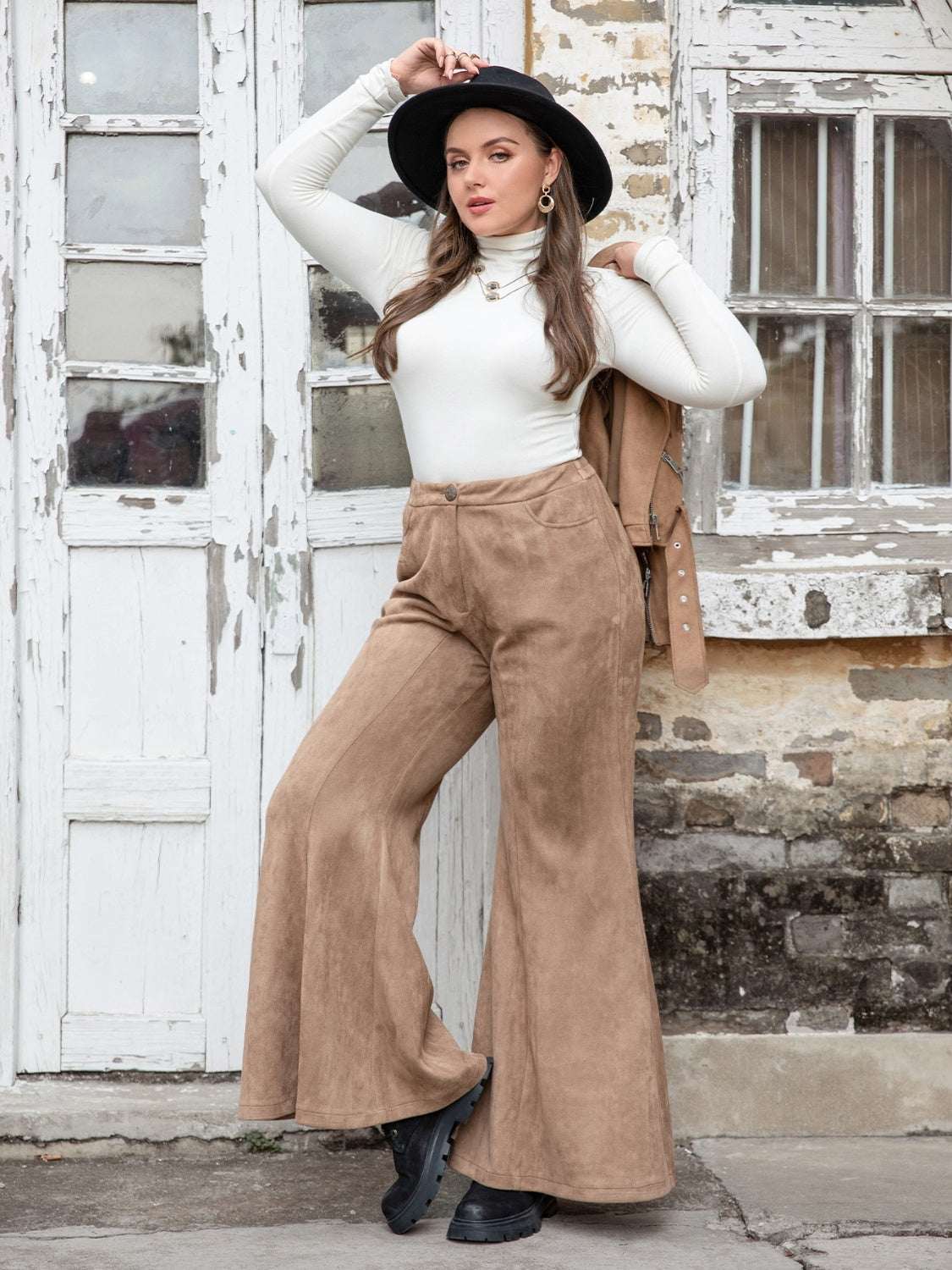 Plus size pocketed flare pants in beige with a stylish opaque finish and a comfortable fit.