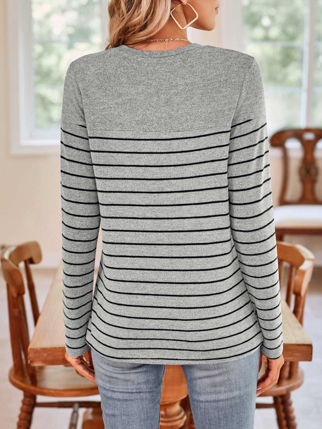 Lovelet Quarter Button Striped Round Neck Long Sleeve T-Shirt with gray and black stripes, back view.