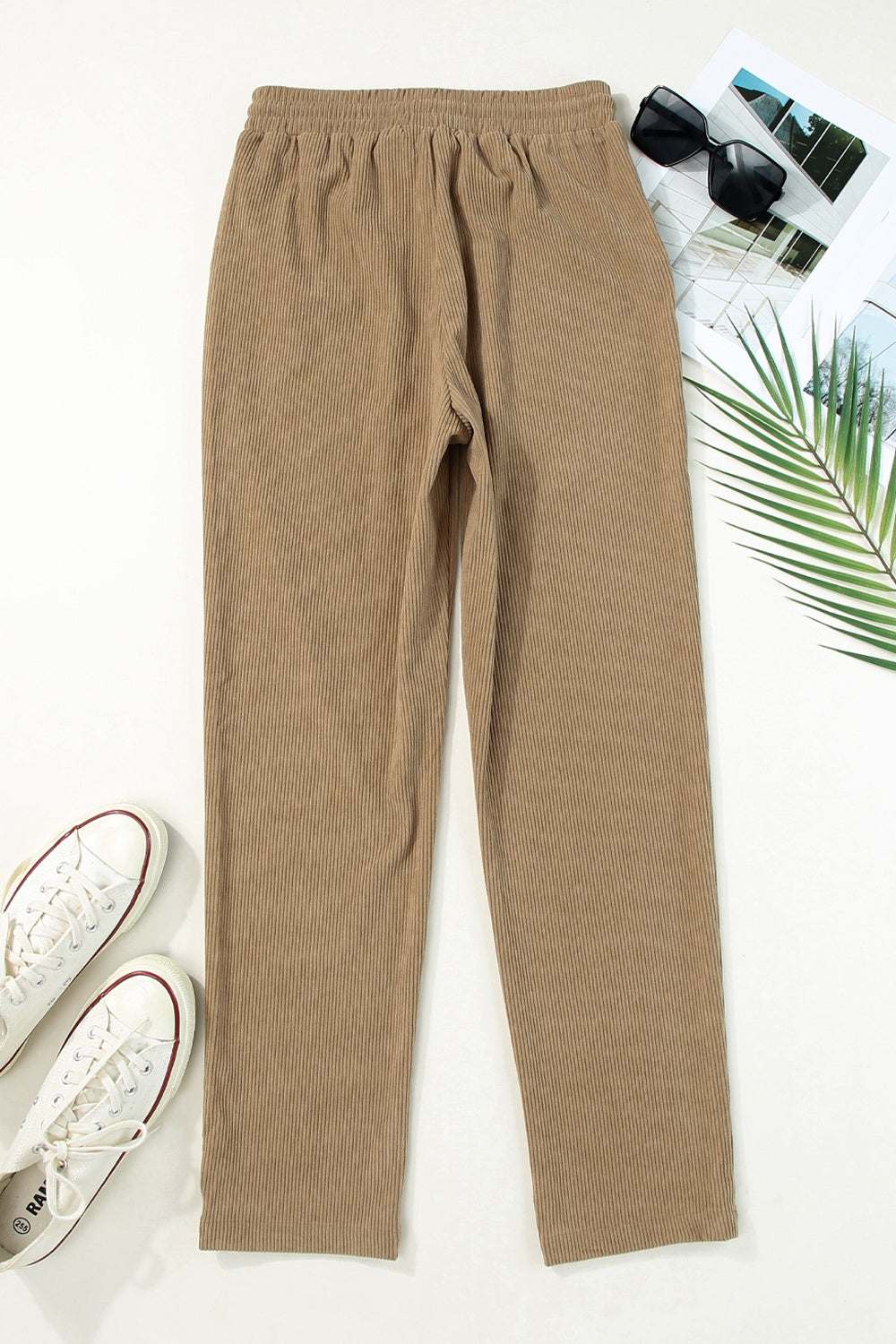 Drawstring straight pants with pockets in brown, 100% polyester, machine washable.