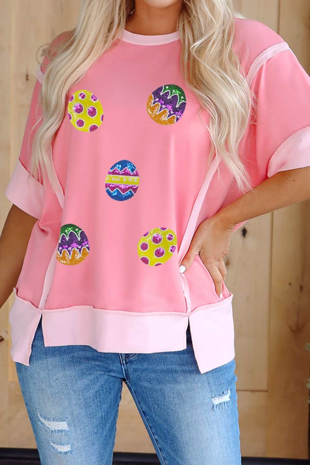 Sequined Easter egg short sleeve t-shirt, pink with colorful patterns.