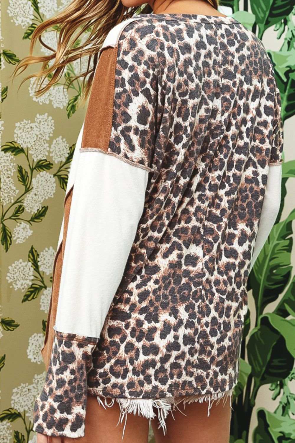 Leopard V-Neck Dropped Shoulder Blouse with slightly stretchy fabric.