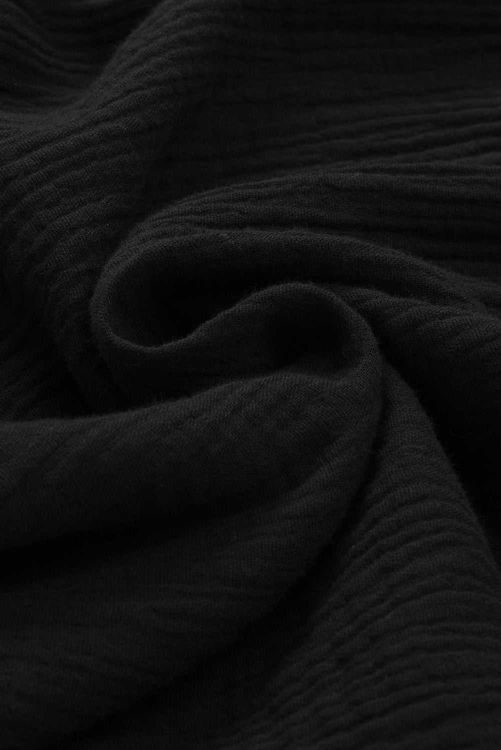 Black cotton fabric texture for Dropped Shoulder V-Neck Blouse.