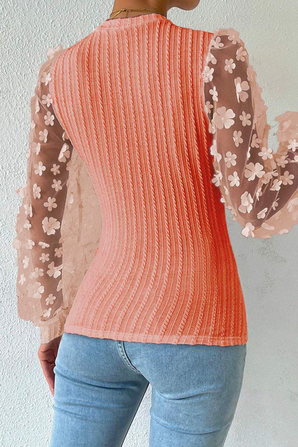 Textured applique long sleeve blouse with cable-knit design and floral sleeves