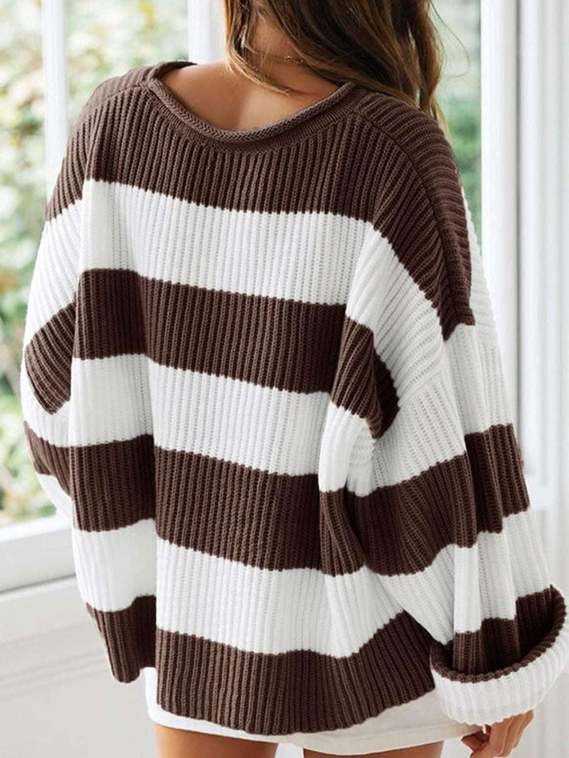 Round neck long sleeve sweater with brown and white stripes, 100% polyester, slightly stretchy.