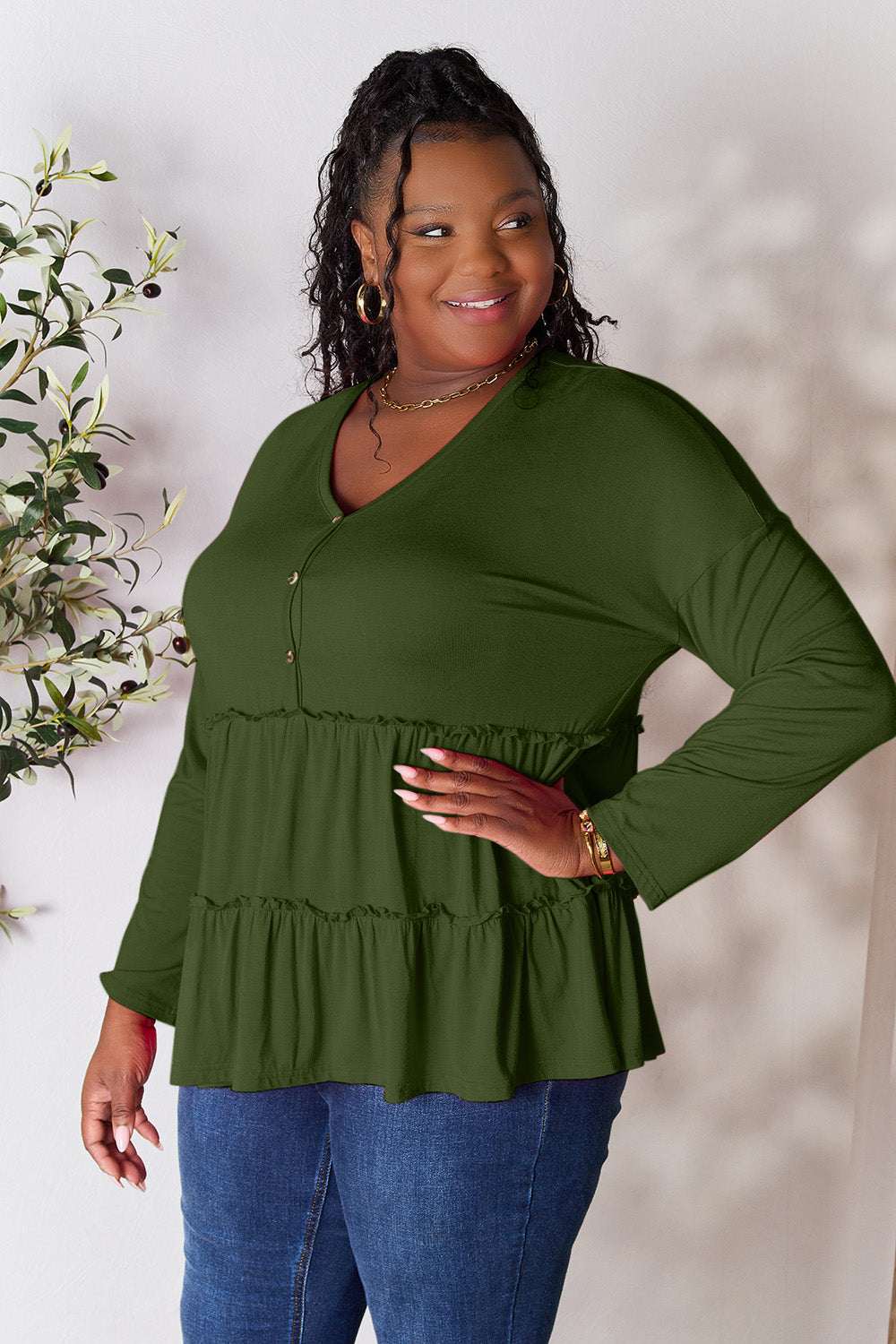 Double Take Half Button Long Sleeve Ruffle Hem Blouse in green with buttoned front and ruffled design.