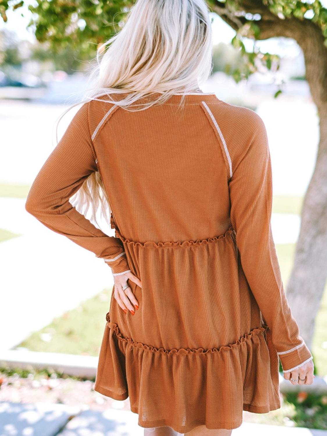 Waffle-knit frill mini tiered dress with long sleeves in brown.