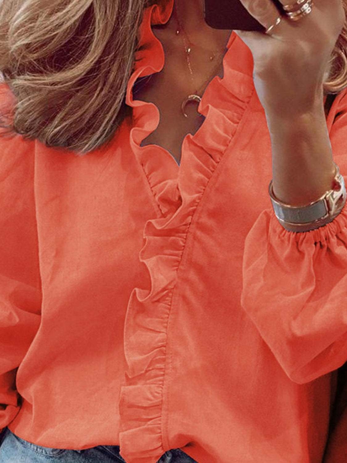 Full Size Ruffled V-Neck Long Sleeve Blouse in orange.