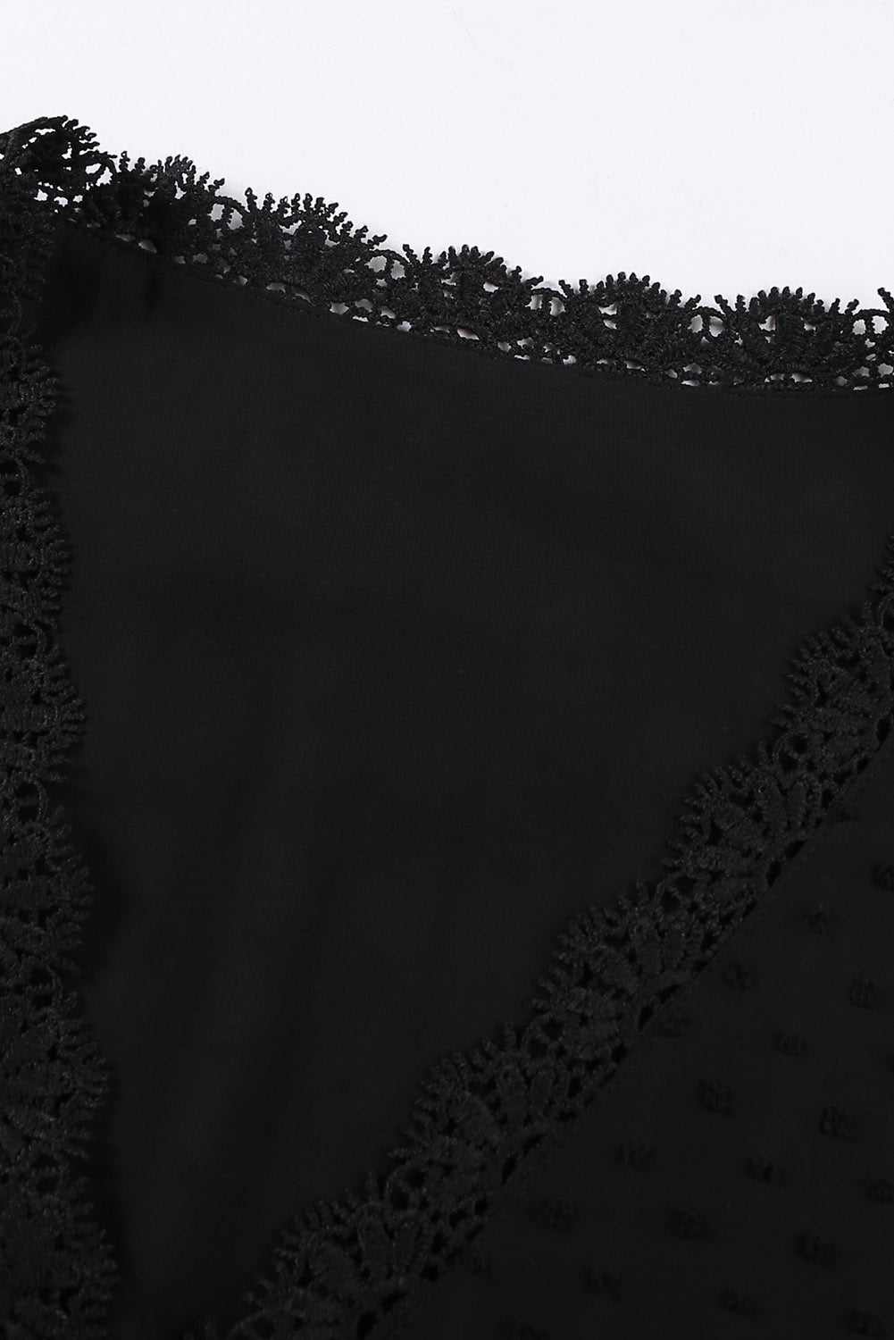 Plus size Swiss dot spliced lace V-neck blouse detail.