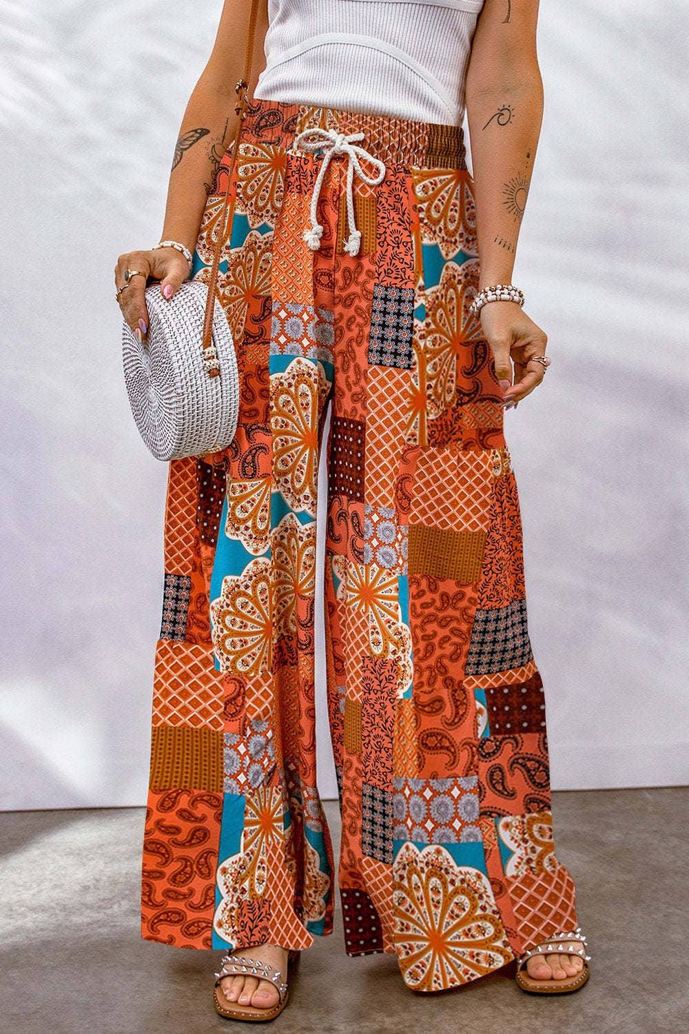 Full size drawstring printed wide leg pants in vibrant patterns.