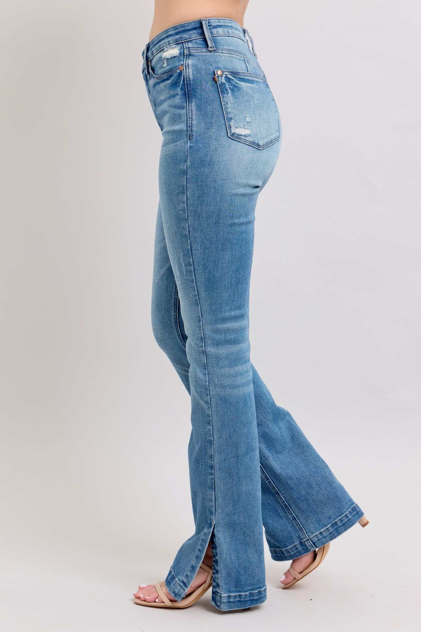 Judy Blue HW tummy control vintage wash side slit slim boot jeans with high waist.