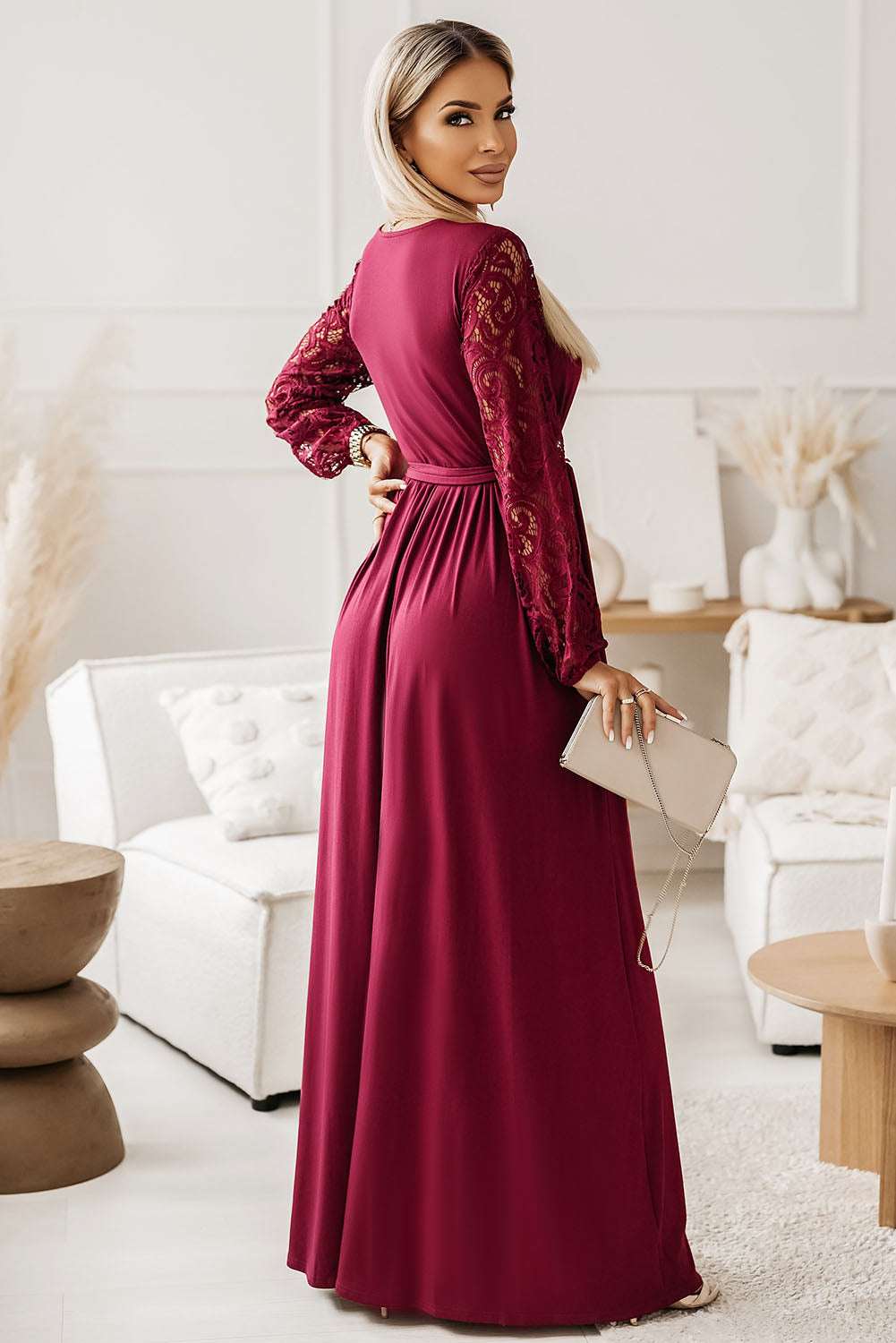 Lace Detail Surplice Tie-Waist Maxi Dress in burgundy color, featuring lace sleeves and flowing silhouette.