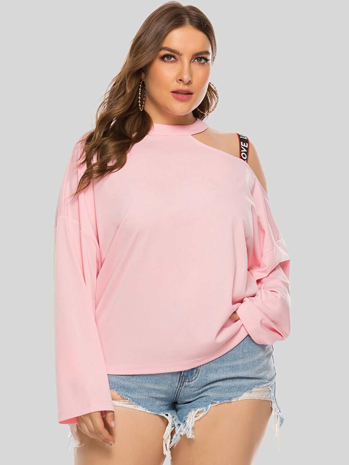 Plus size pink cold-shoulder round neck blouse with asymmetrical cutout and long sleeves