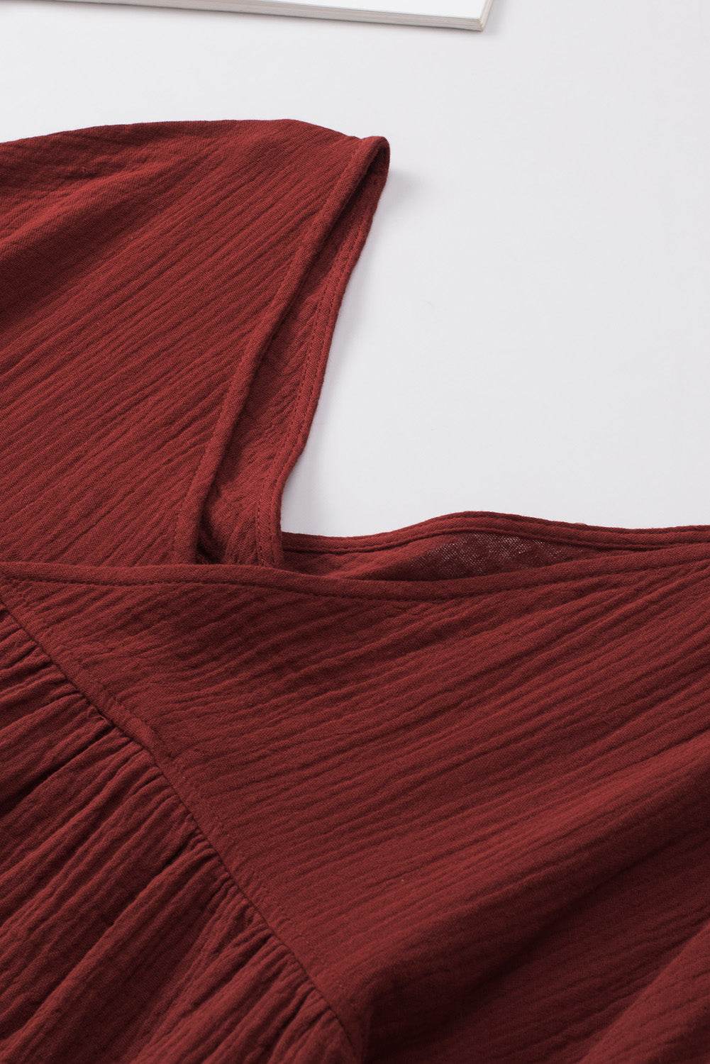 Dropped Shoulder V-Neck Blouse in red, featuring long sleeves and solid pattern.