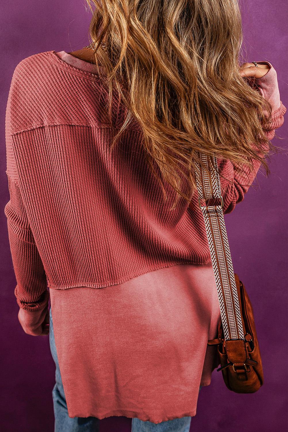 Notched neck long sleeve slit blouse in opaque, slightly stretchy fabric.