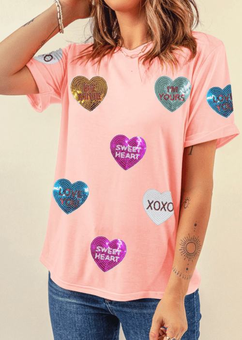 Valentine’s Day sequin heart short sleeve T-shirt with round neck.