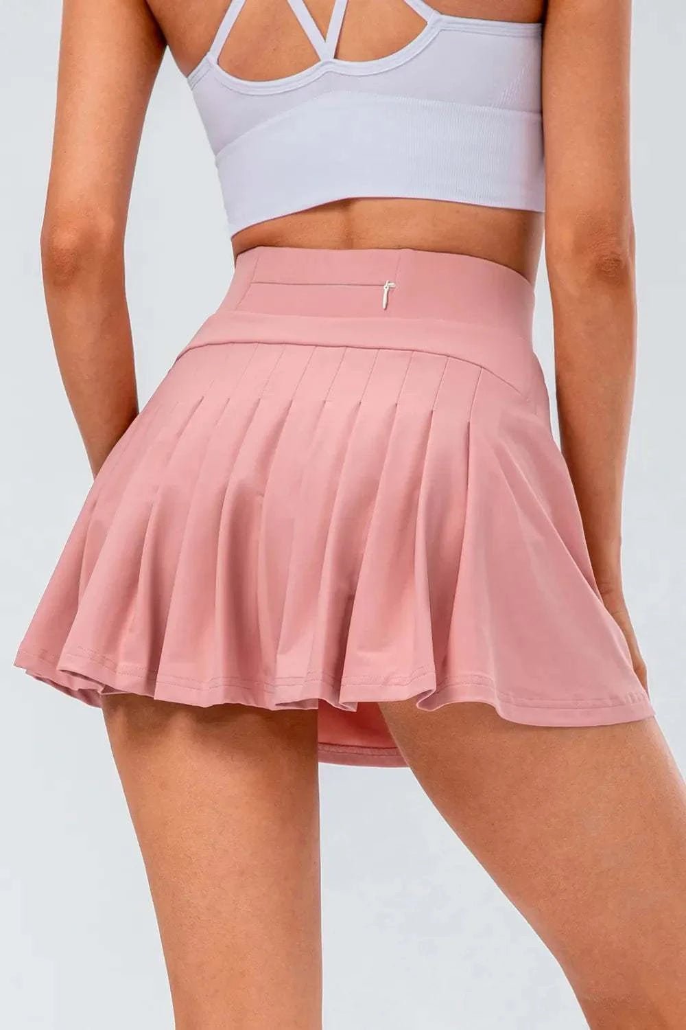High Waist Pleated Active Skirt in pink, highly stretchy nylon-spandex blend.