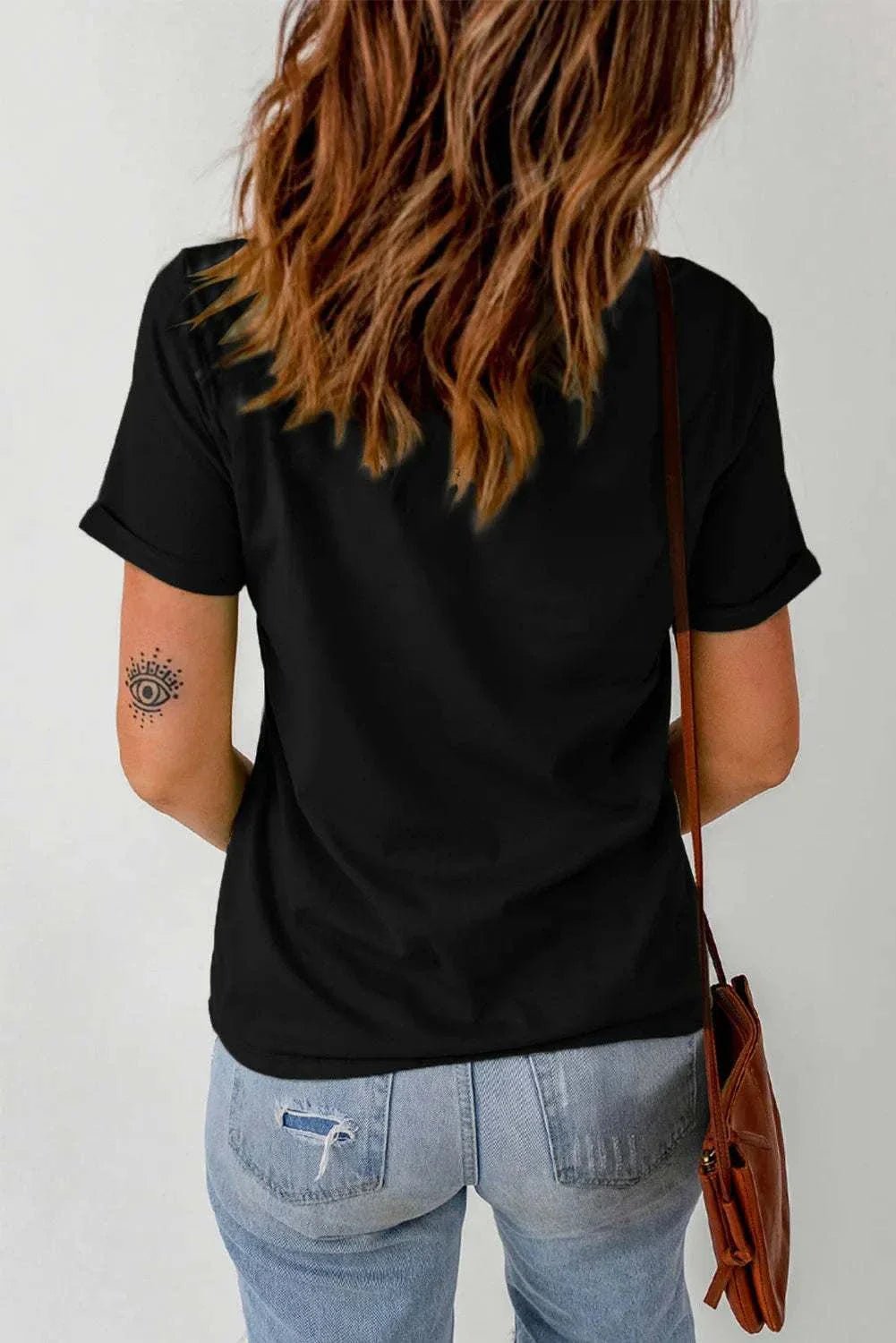 Letter graphic round neck short sleeve T-shirt in black, slightly stretchy fabric.