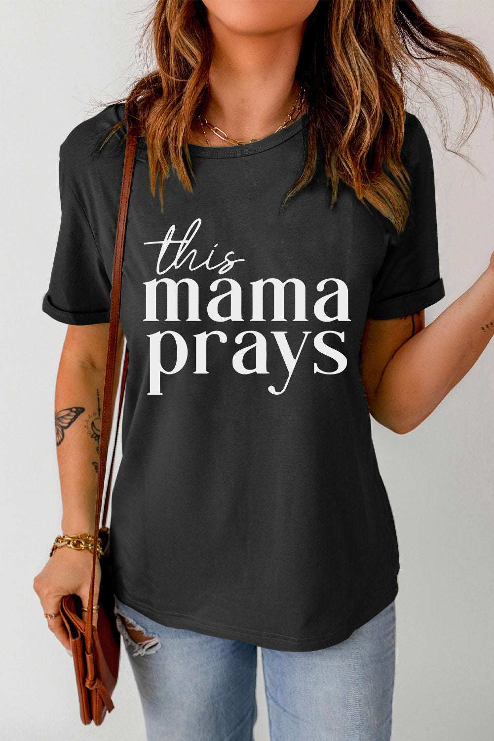 THIS MAMA PRAYS graphic tee, casual style, short sleeves, round neck.