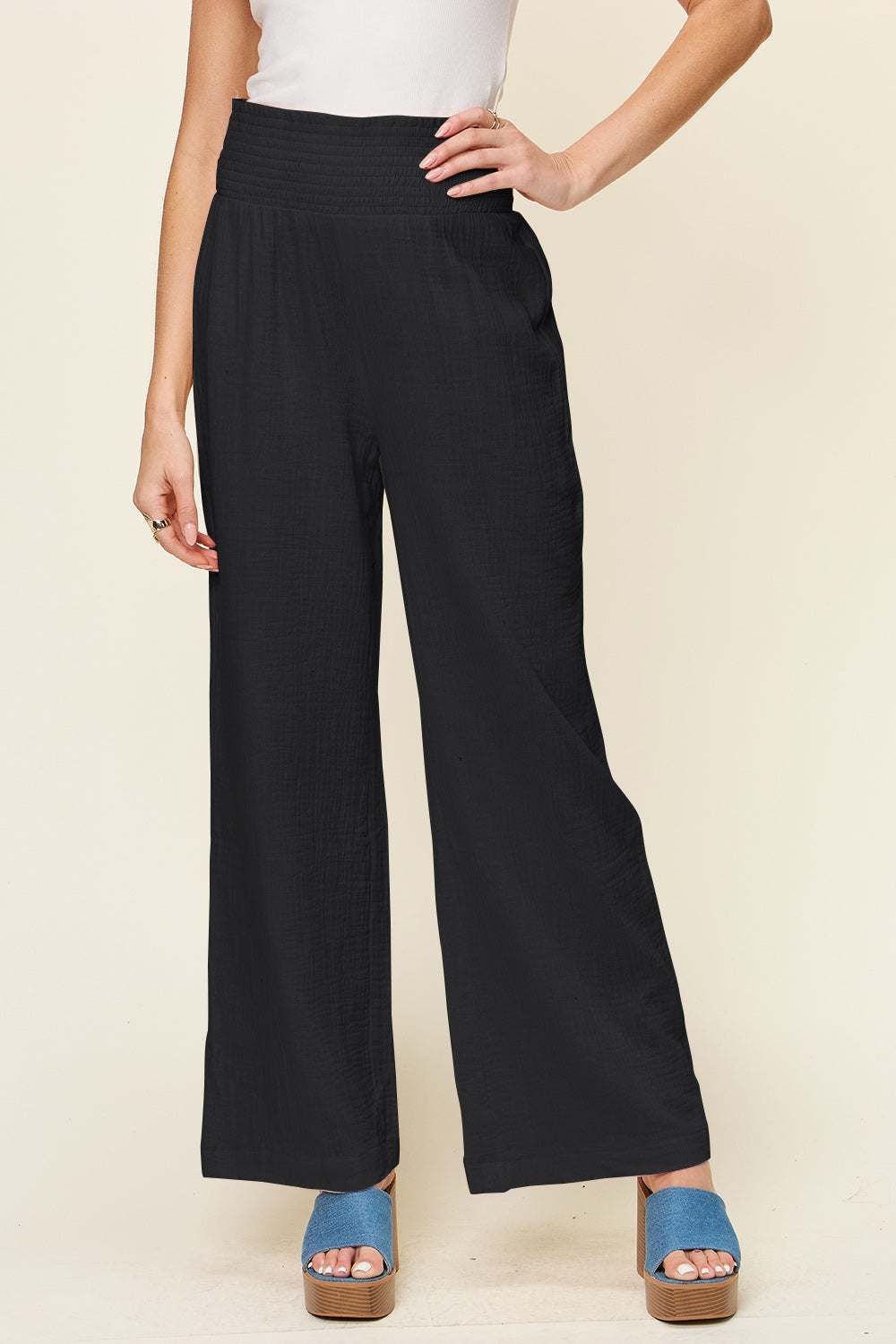 Double Take full-size smocked waist wide leg pants in black.