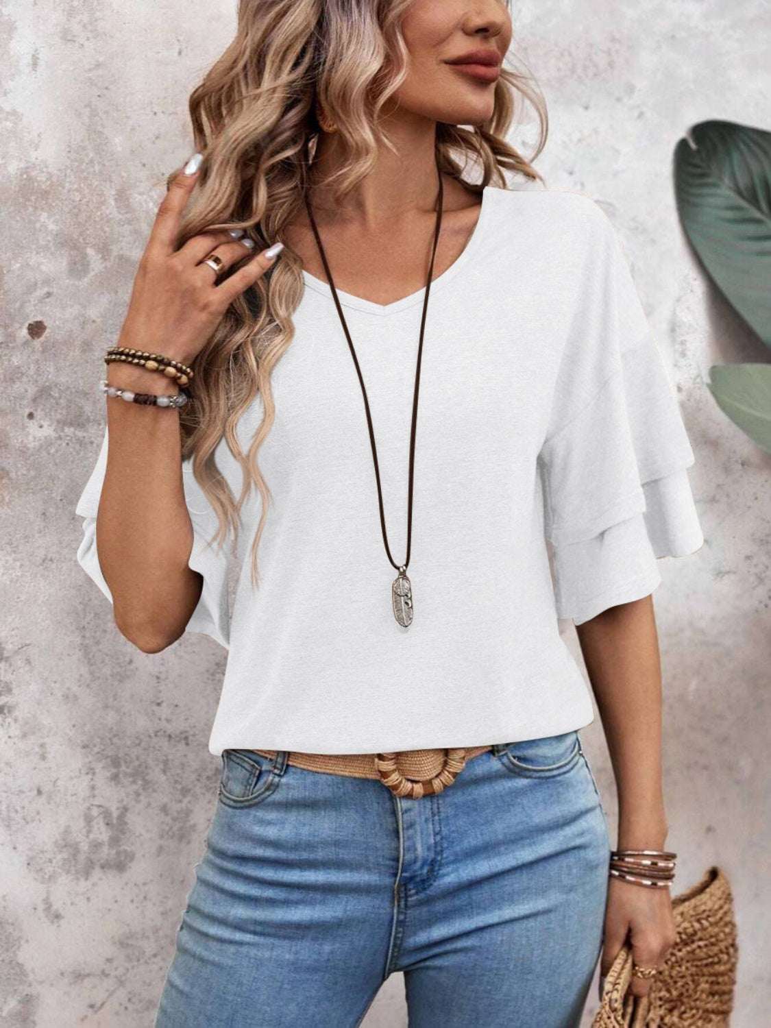 V-Neck Half Sleeve Blouse, slightly stretchy polyester-rayon blend.