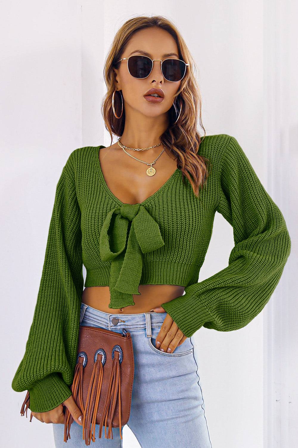 Bow V-Neck Long Sleeve Cropped Sweater in green, slightly stretchy acrylic material.