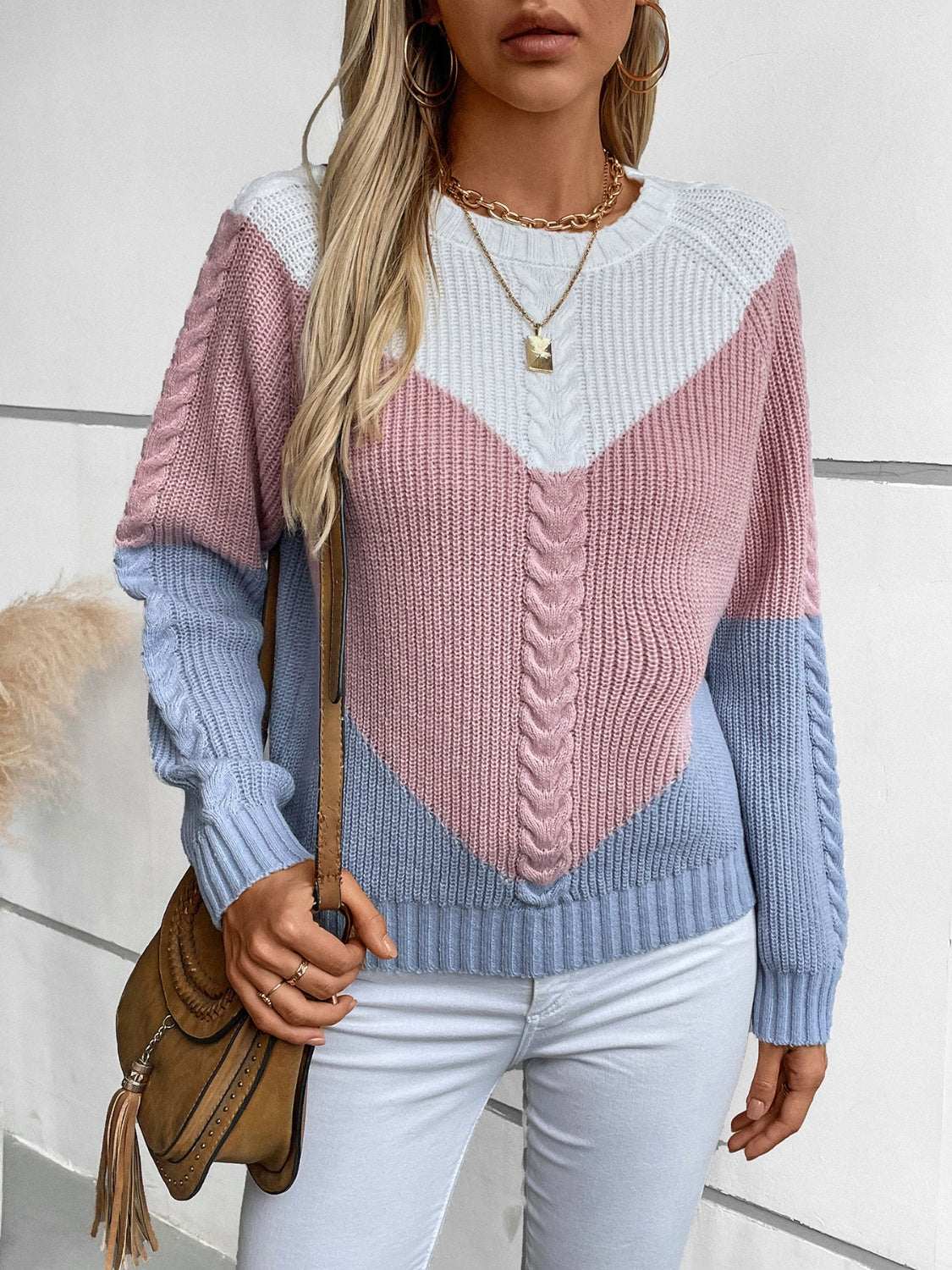 Color block round neck long sleeve sweater in pastel shades.