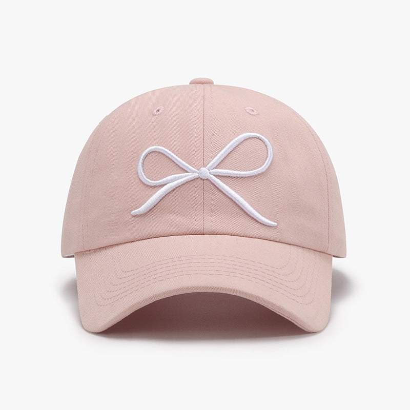 Bow Embroidered Cotton Baseball Cap with pink design and white bow embroidery.