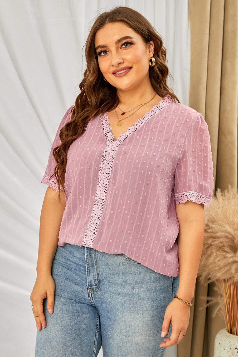 Plus size Swiss dot spliced lace V-neck blouse with short sleeves.