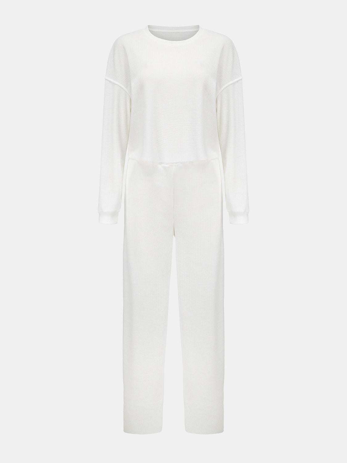 Waffle-knit round neck top and pants set in white.