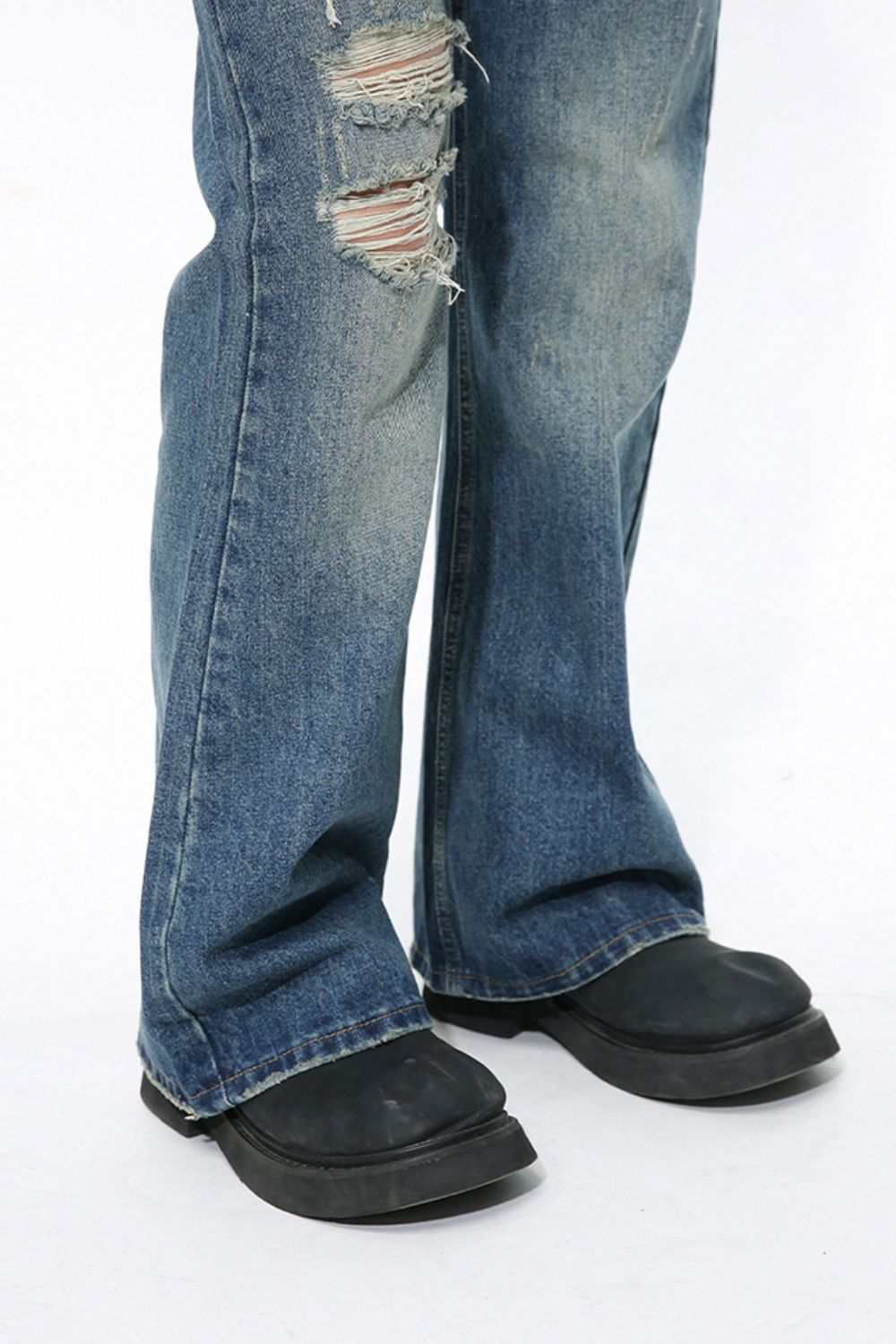 Men's distressed bootcut jeans with basic style and no stretch.