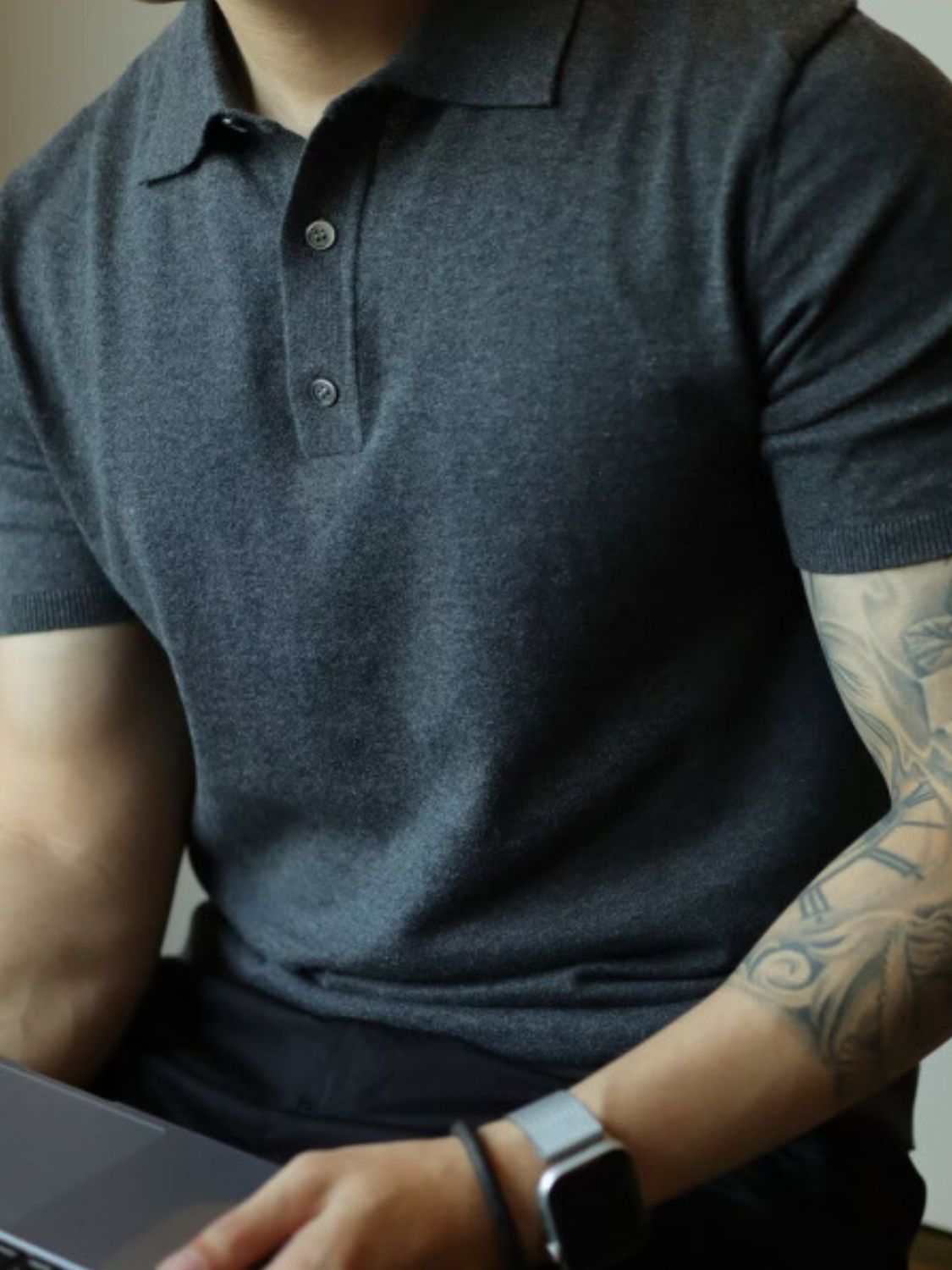 Men's plus size short sleeve polo with button detail, slightly stretchy fabric, vinyl and cotton blend.