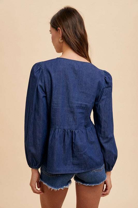 Annie Wear Tie Front Peplum Long Sleeve Denim Top, back view, showcasing elegant peplum design and long sleeves.