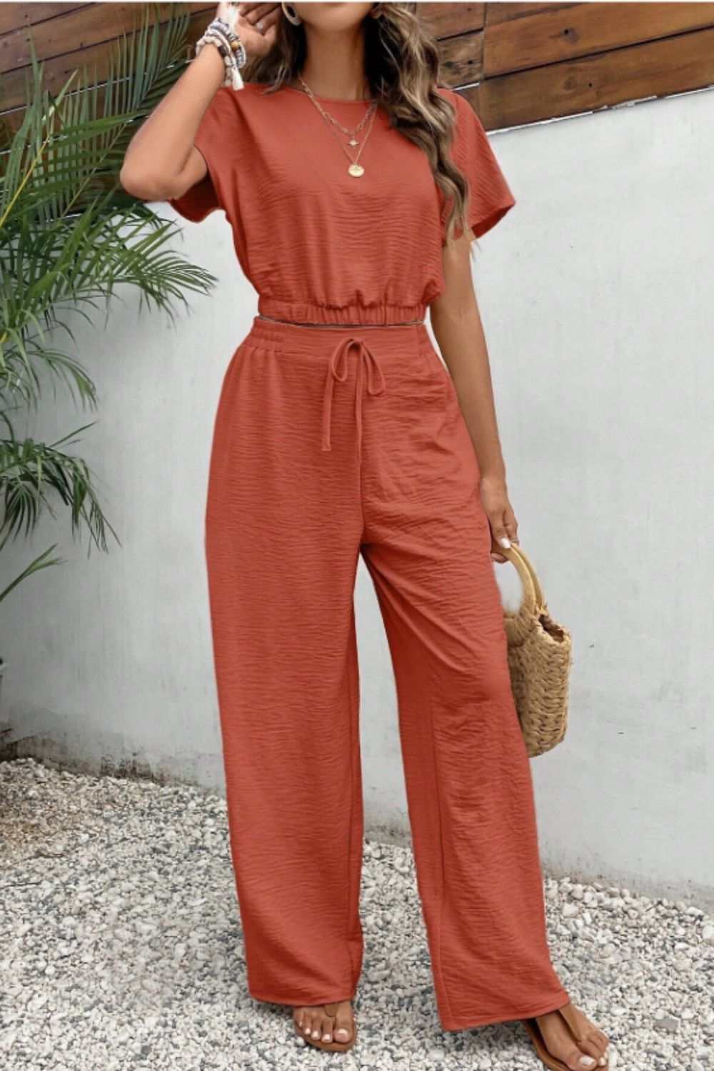 Round Neck Short Sleeve Top and Pants Set, two-piece, buttoned, tied, 100% polyester.