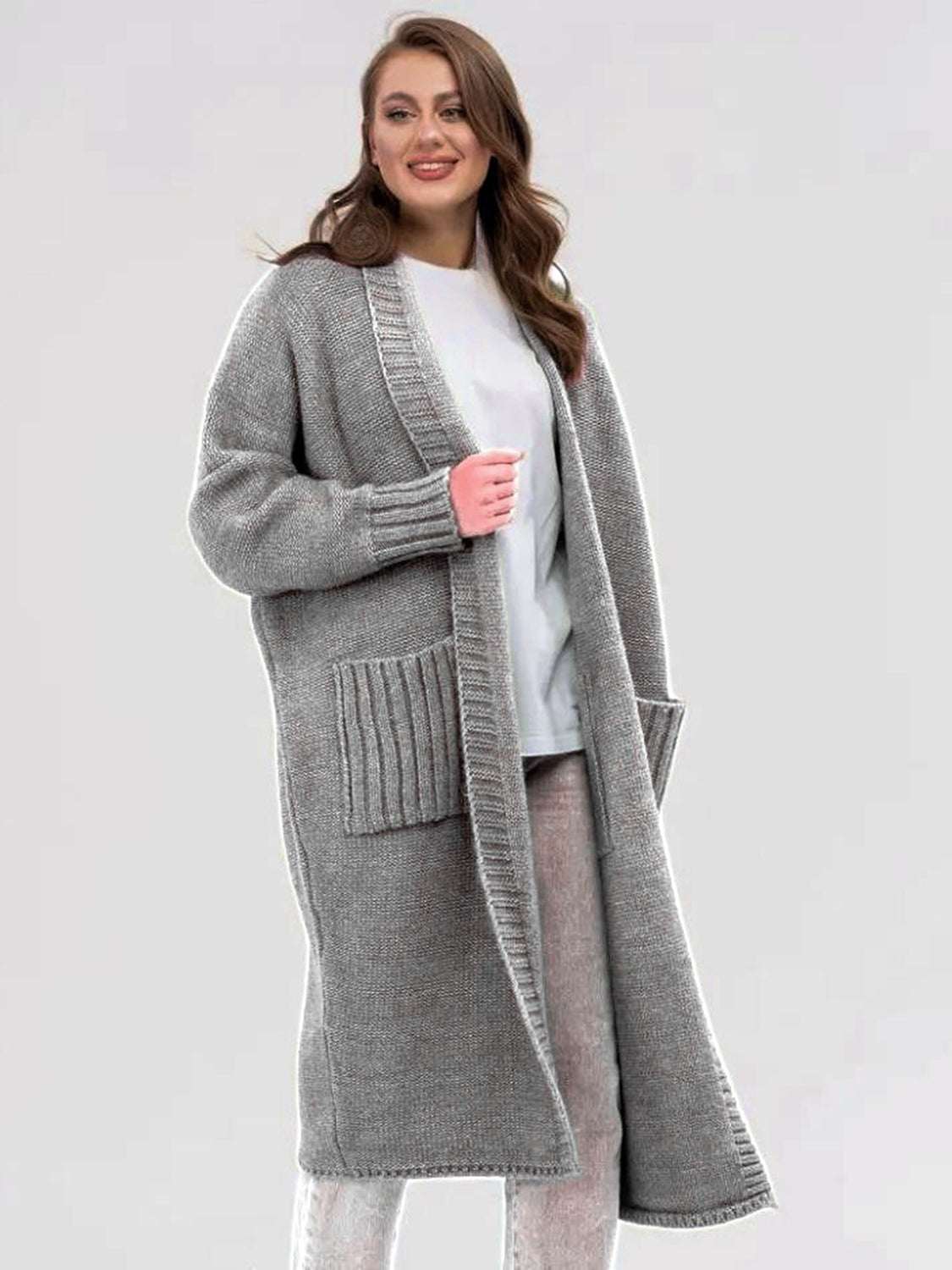 Pocketed open front long sleeve longline cardigan in gray with moderate stretch.