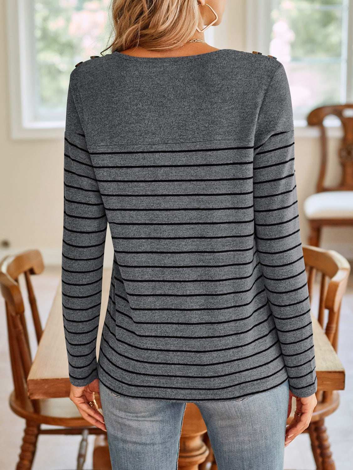Lovelet striped round neck long sleeve t-shirt with decorative button and slightly stretchy material.