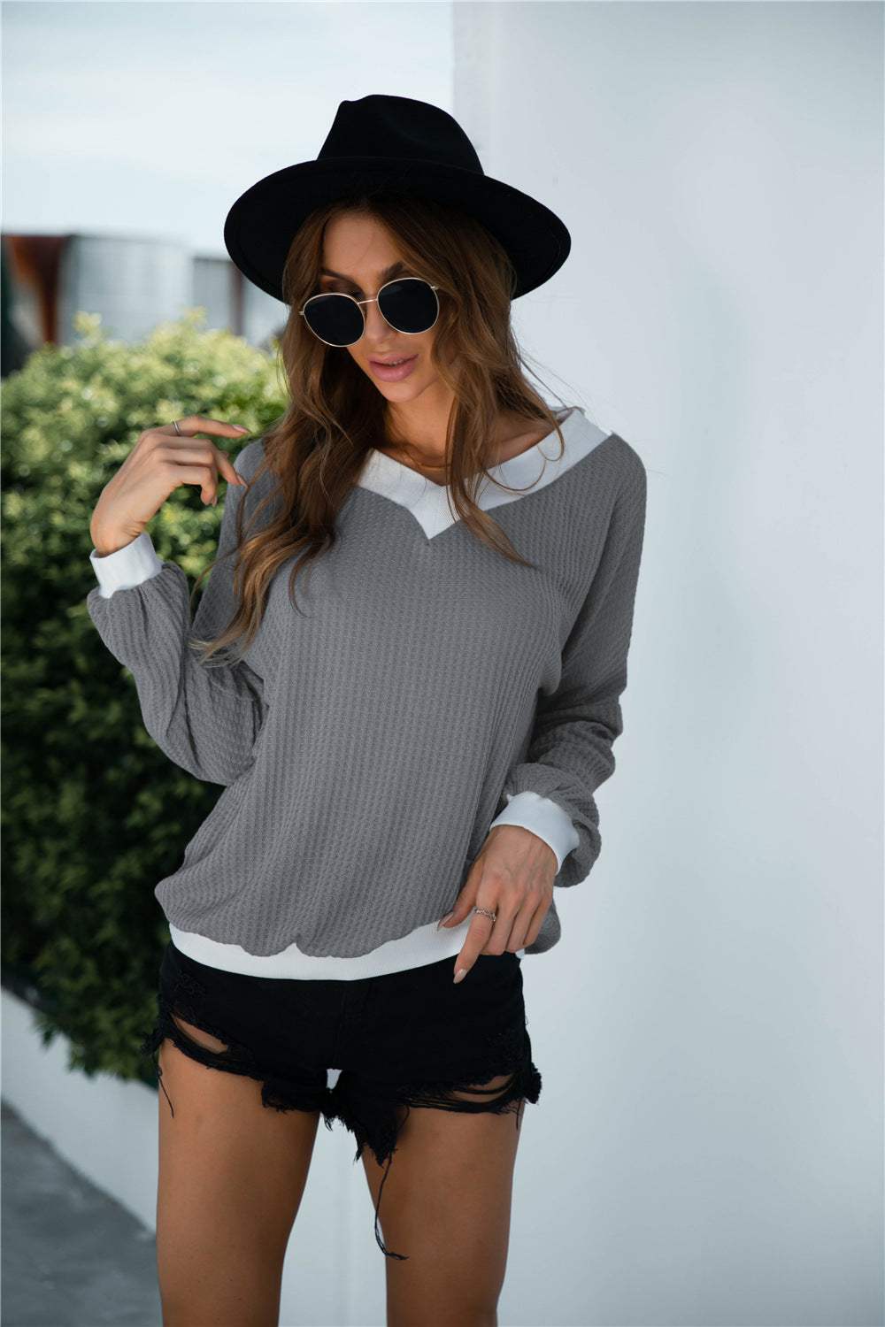 Off-Shoulder Waffle-Knit Dropped Shoulder Blouse with lantern sleeves, casual style.