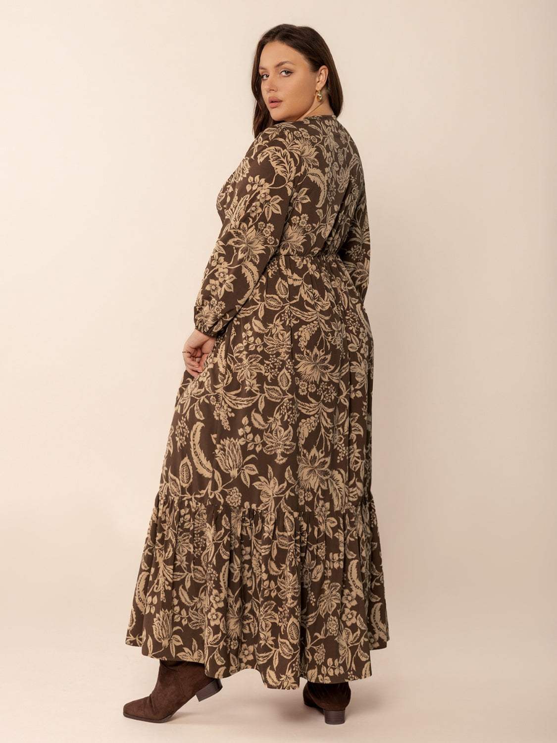 Plus size printed V-neck balloon sleeve maxi dress in floral design.