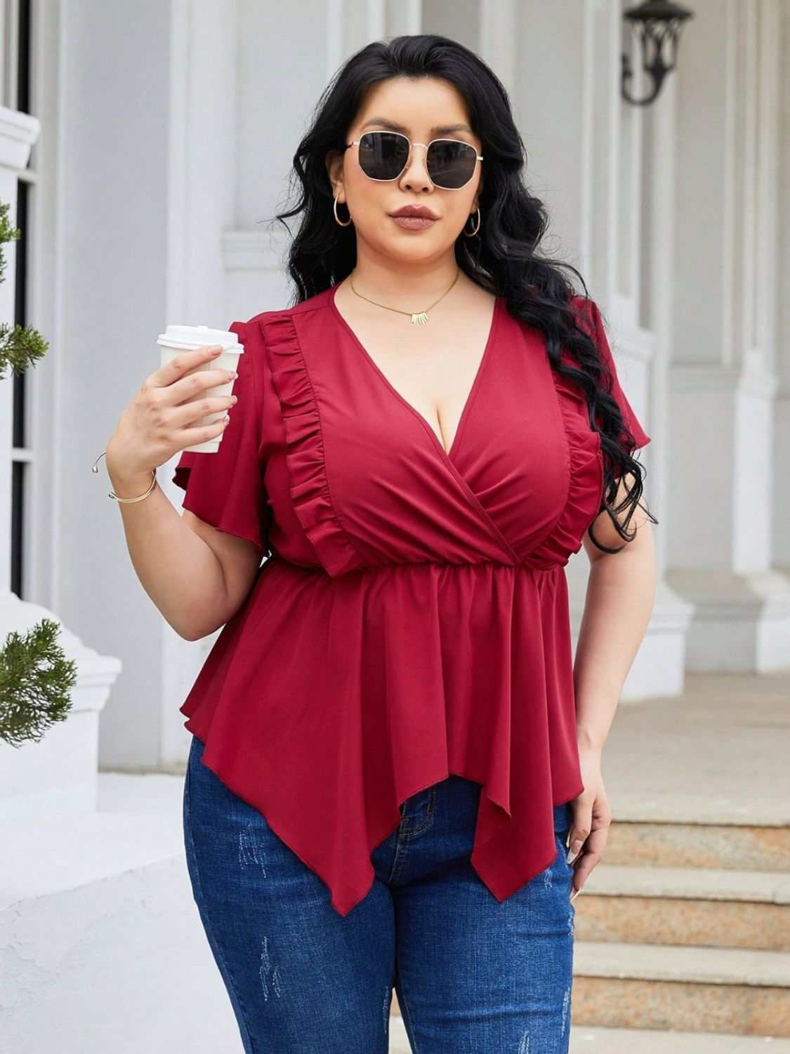 Plus size frill surplice flutter sleeve blouse in red.
