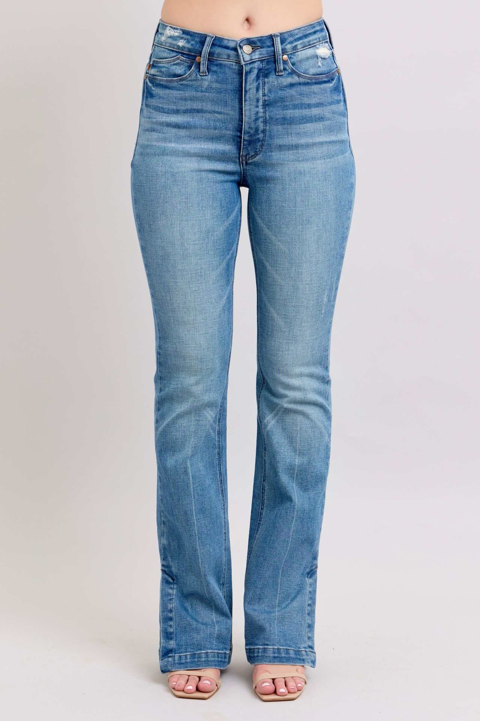 Judy Blue HW high-waisted vintage wash slim bootcut jeans with tummy control and side slit.