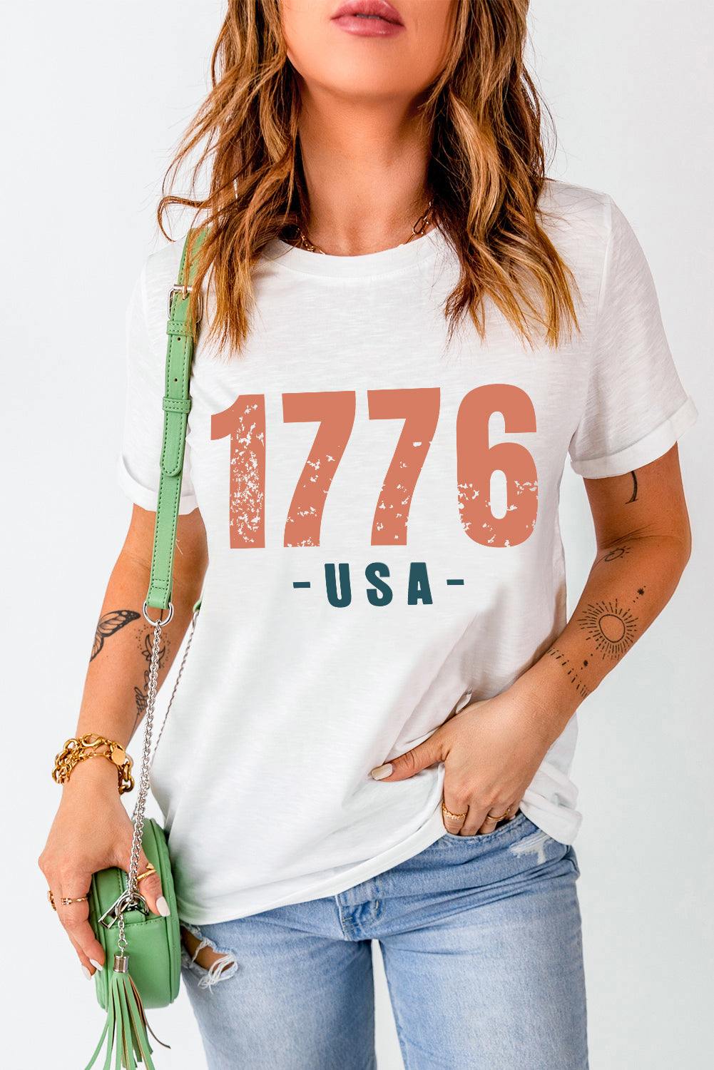 Graphic round neck short sleeve T-shirt with "1776 USA" print, women's casual style.