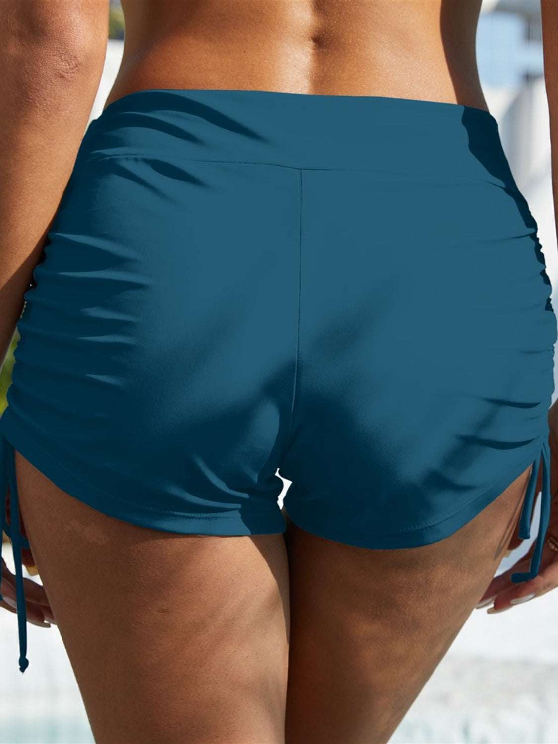 FAM-FAM Drawstring Mid-Rise Waist Swim Shorts in blue, slightly stretchy polyester-spandex blend.