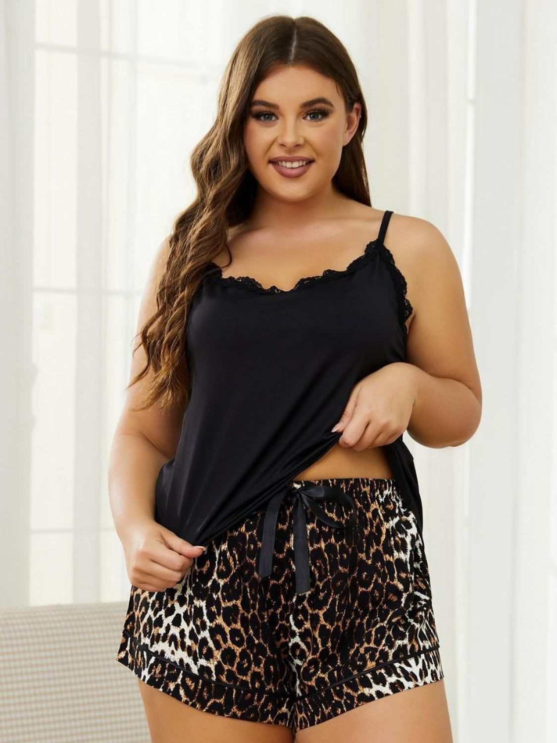 Plus size lace trim scoop neck cami with animal print shorts pajama set.