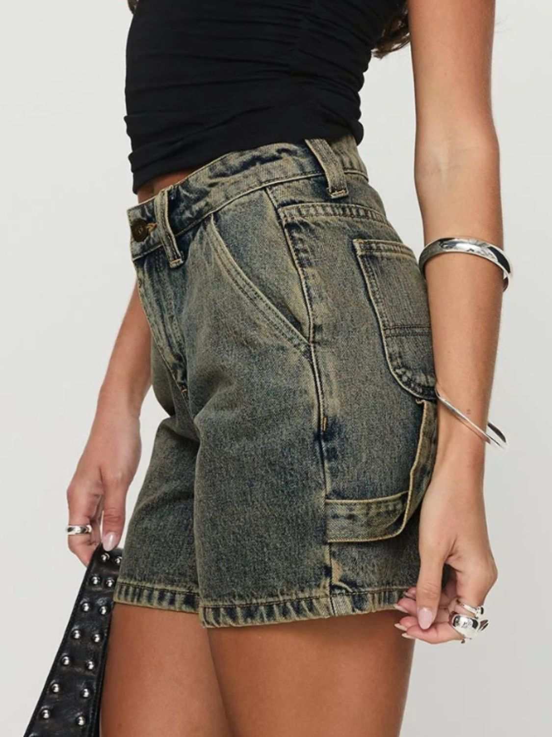 Washed high rise denim shorts with pockets and no stretch.