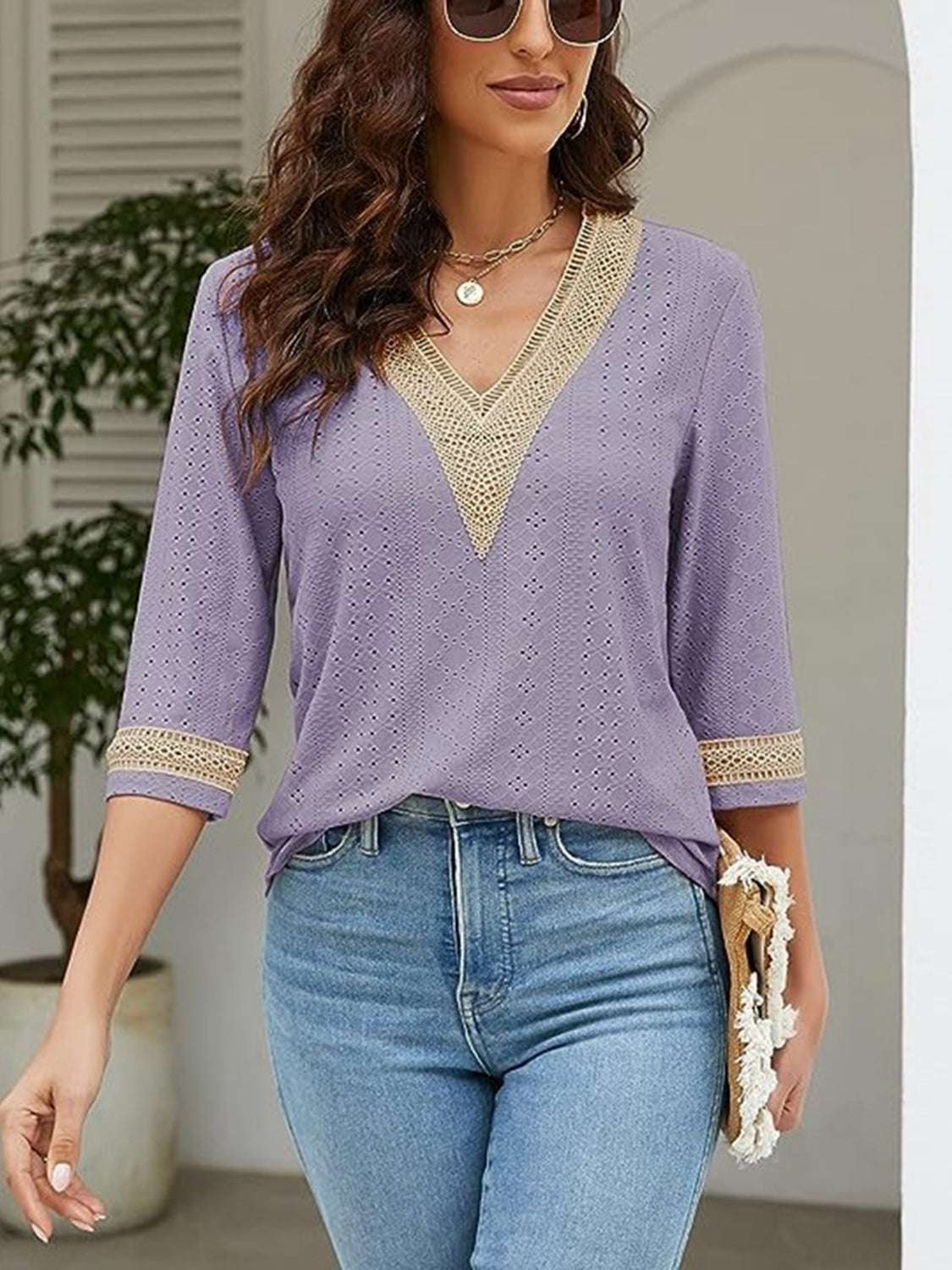 V-Neck Eyelet Blouse in lavender, featuring a basic style with no stretch and crochet detailing on the neckline and sleeves.