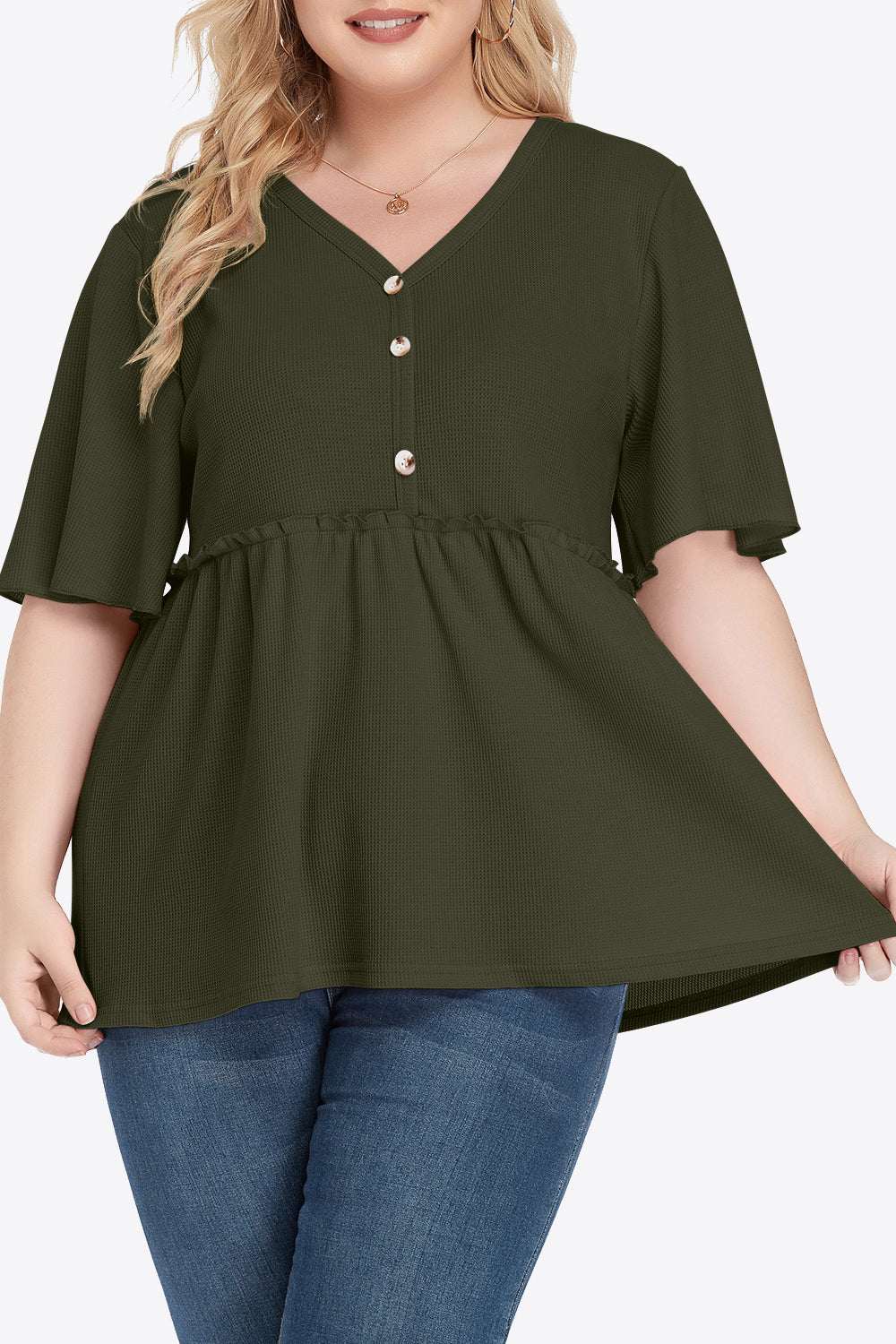 Plus size solid babydoll blouse with V-neck, buttoned front, and frill trim.