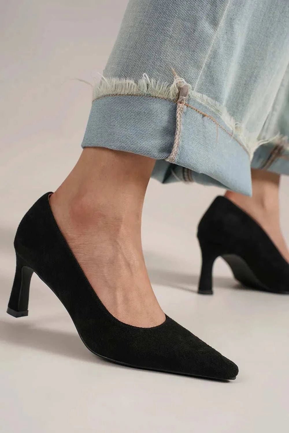 Beast Fashion Faux Suede Point Toe Pumps with mid heels.