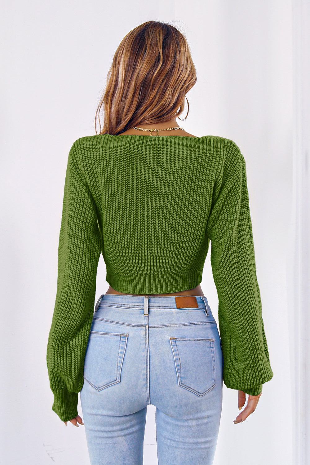 Bow V-Neck Long Sleeve Cropped Sweater in green, slightly stretchy acrylic material.