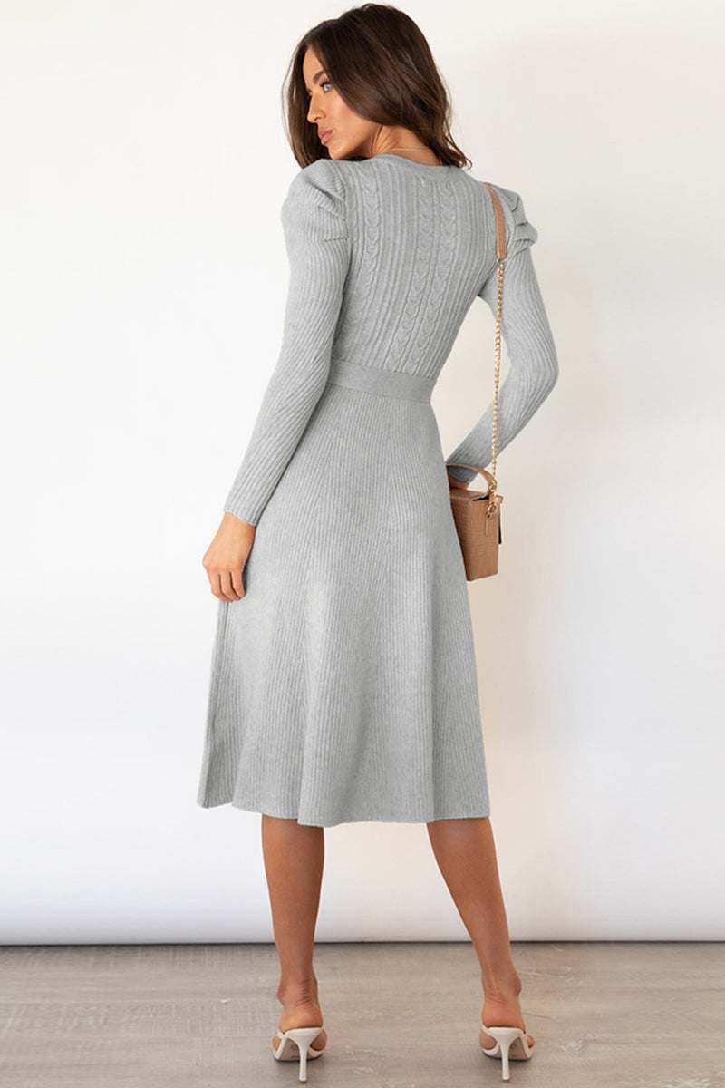 Round neck long sleeve tie waist sweater dress in light gray, side view.