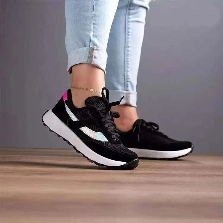 Mesh Contrast Round Toe Sneakers with rubber sole and mesh upper, worn with light jeans.