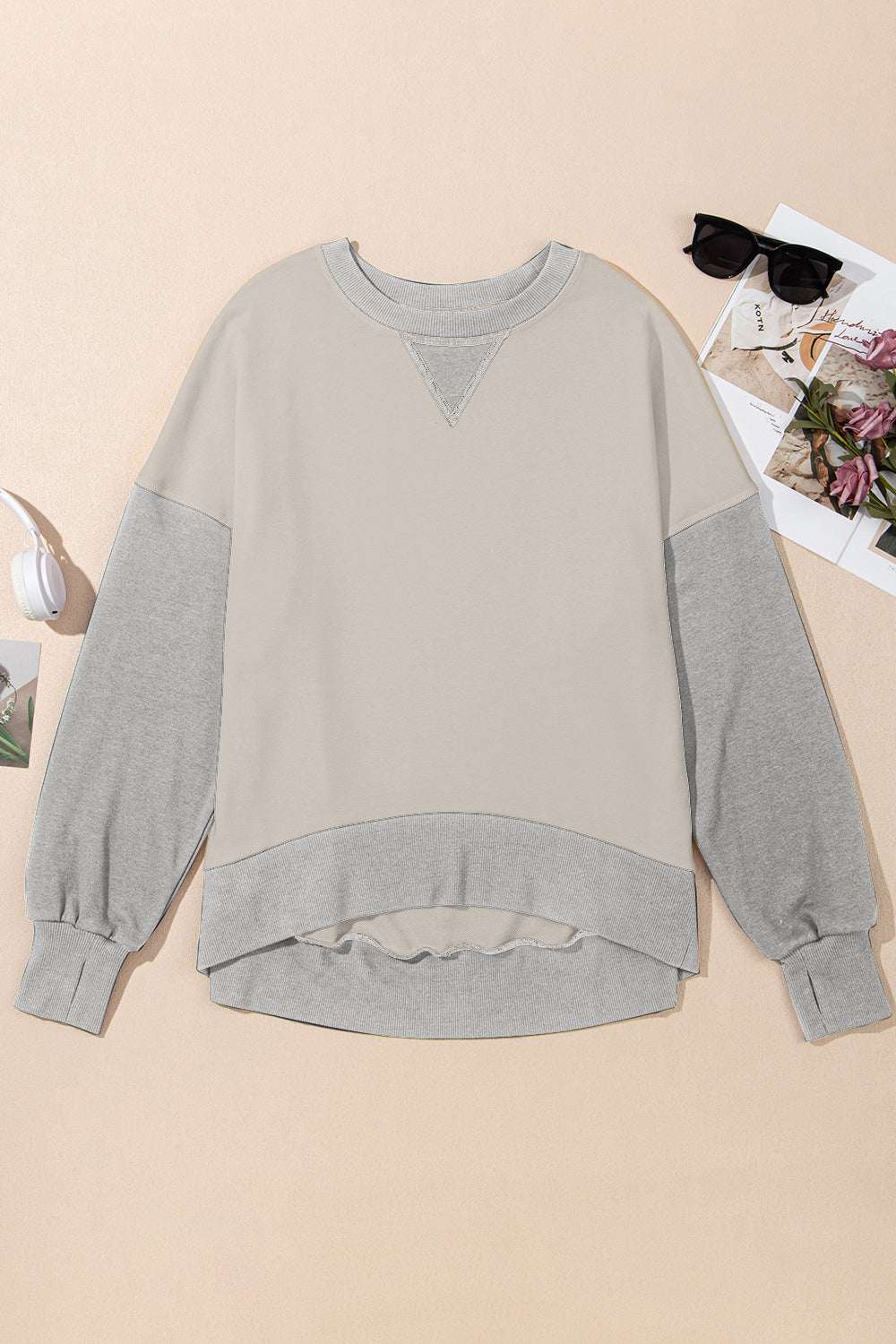 Contrast round neck long sleeve sweatshirt in beige and gray, polyester and cotton blend.
